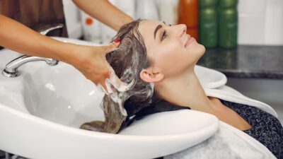 woman washing head hairsalon 1157 27179 jpg