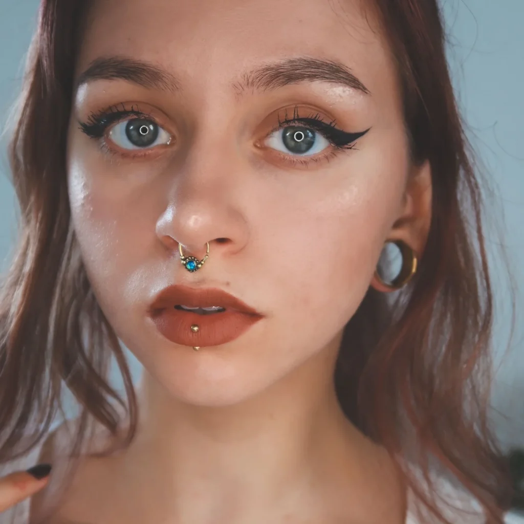 blue-synth-opal-drop-brass-seamless-septum-ring-model-shot e8be5991-7f8c-4232-b66a-8e6930fcac1a