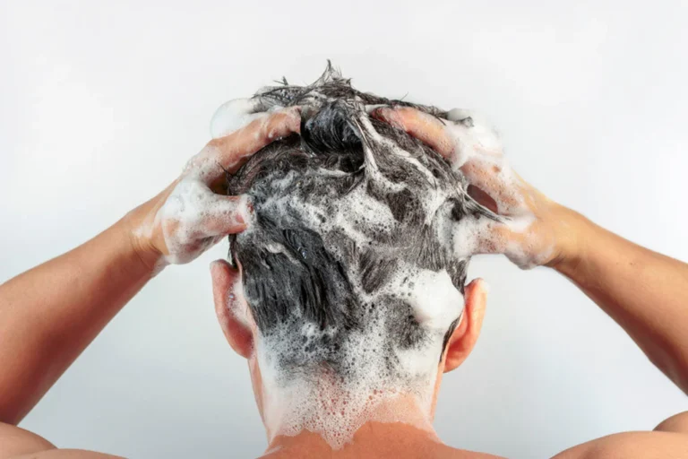 man-washing-hair 8a631ad6-8d7d-45be-8505-91eb7f386f4d 1024x1024