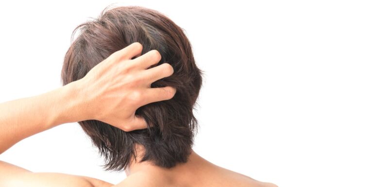 rear-view-of-man-touching-hair-over-white-royalty-free-image-903697206-1547664086
